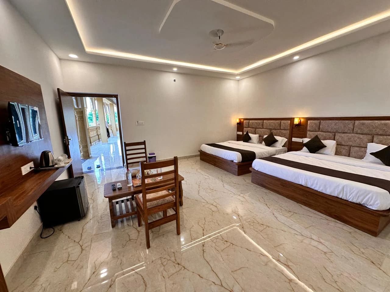 Palace room with twin beds and garden view